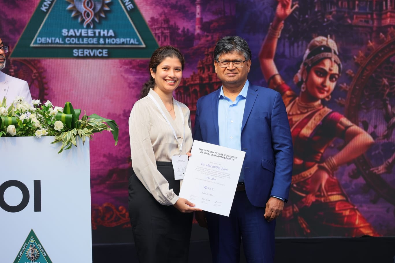 Dr. Harshitha Alva receiving the ICOI Fellowship Certificate